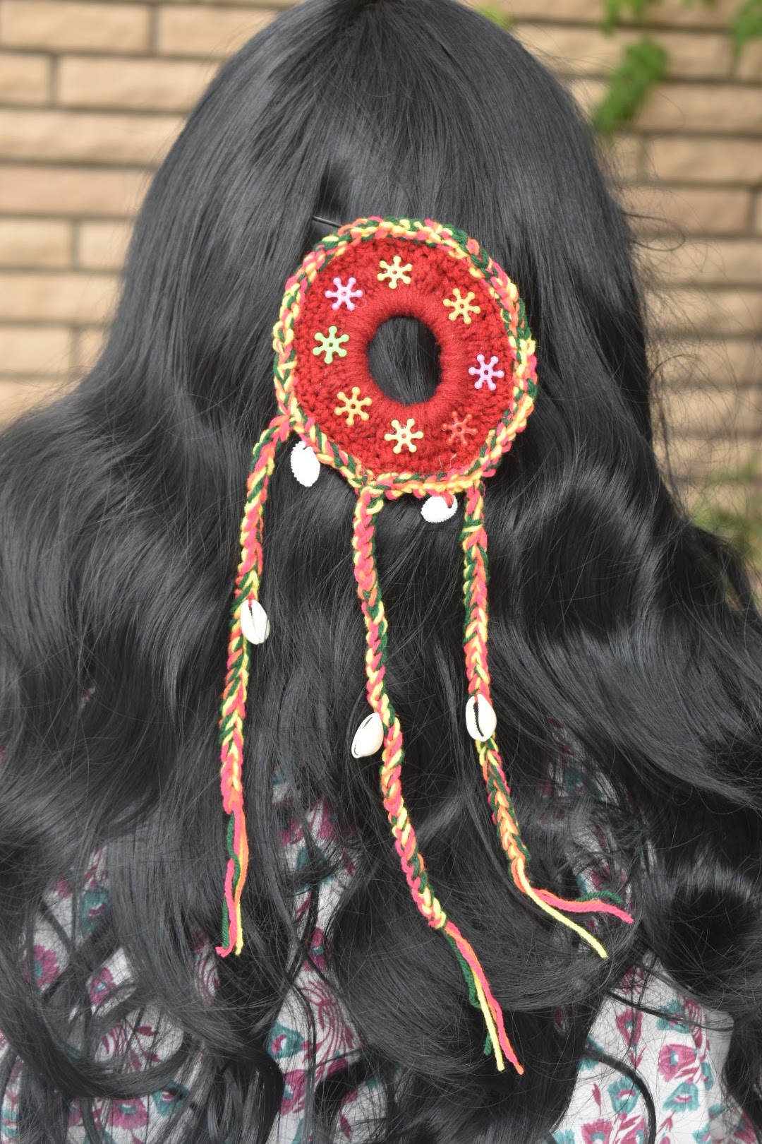 A chic boho-style hair accessory worked with 4-ply acrylic yarn and a 3.5 mm hook around a plain scrunchie base. Functional, trendy, and perfect for holiday or beach wear.