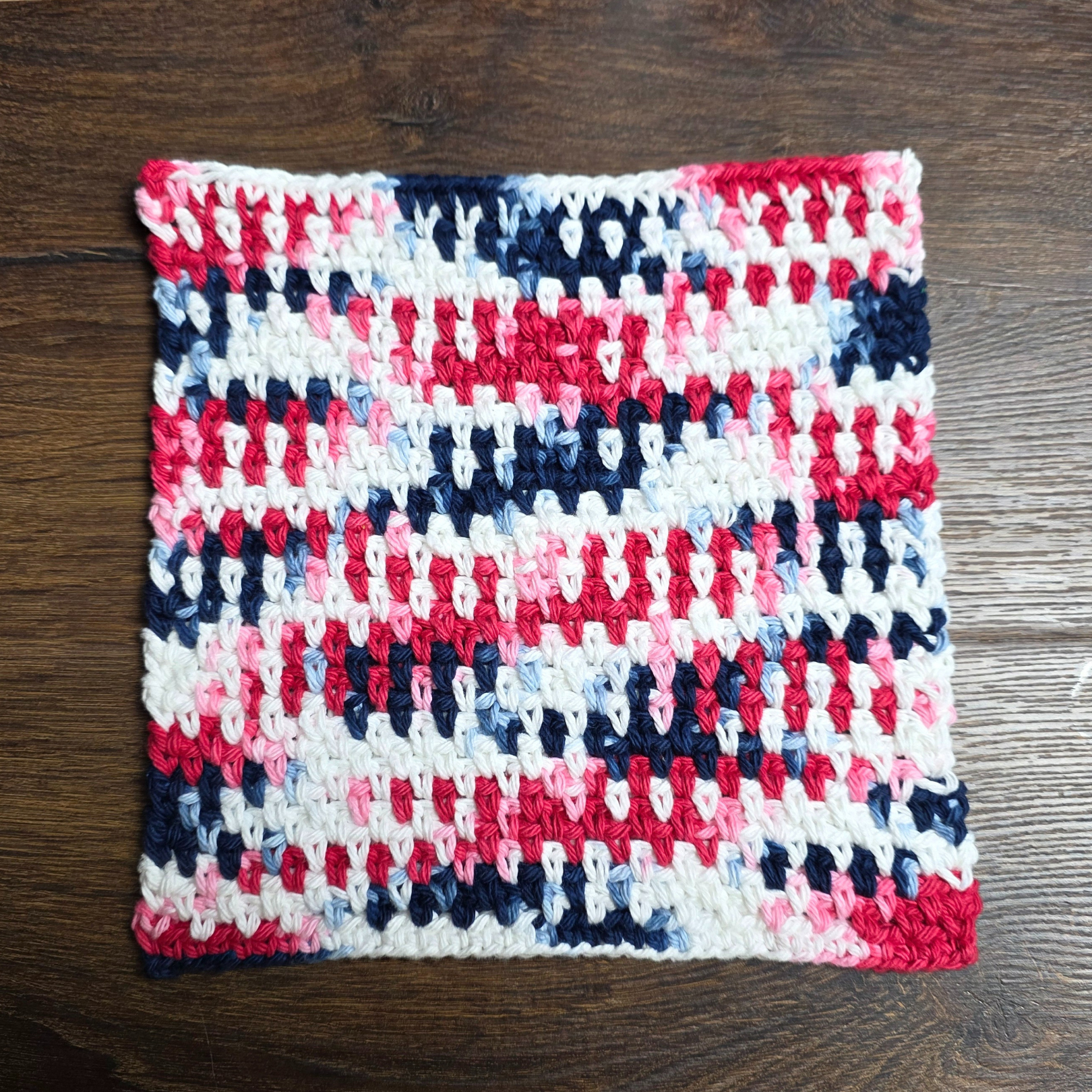 Crochet your own Linen Stitch Dishcloth with this free and easy-to-follow pattern. Made with Medium Weight Cotton Yarn and a 4 mm hook, this textured square works up fast and makes a great gift or addition to your home. Perfect for beginners!