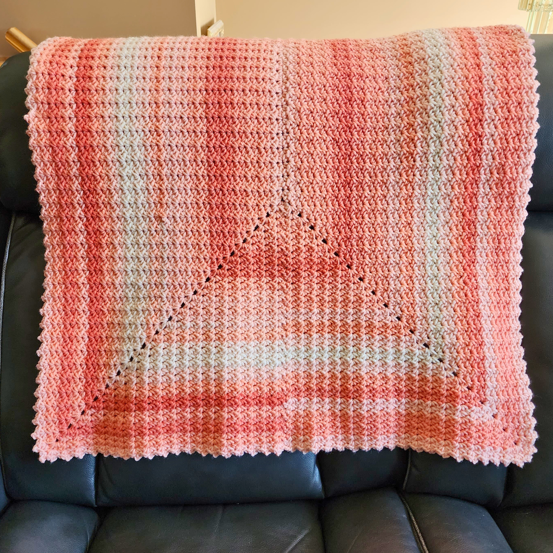 The Endless Rectangle Blanket Pattern is available in 7 popular sizes. This project is crocheted from the center out, in joined, turned rounds and this blanket looks beautiful when worked in a single color of yarn, in ombre yarn, or when you change colors every few rounds (like I did for my Endless Afghan Square).