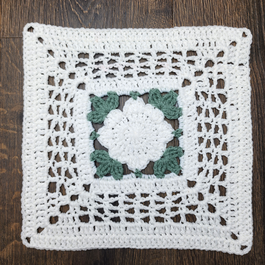 Flower Box Afghan Square Free Crochet Pattern. Red Heart with Love Yarn and a 5.5 mm crochet hook. BAMCAL 2023. #yarnspirations #redheartyarns #crochet #grannysquare #afghanblock #afghansquare #freepattern