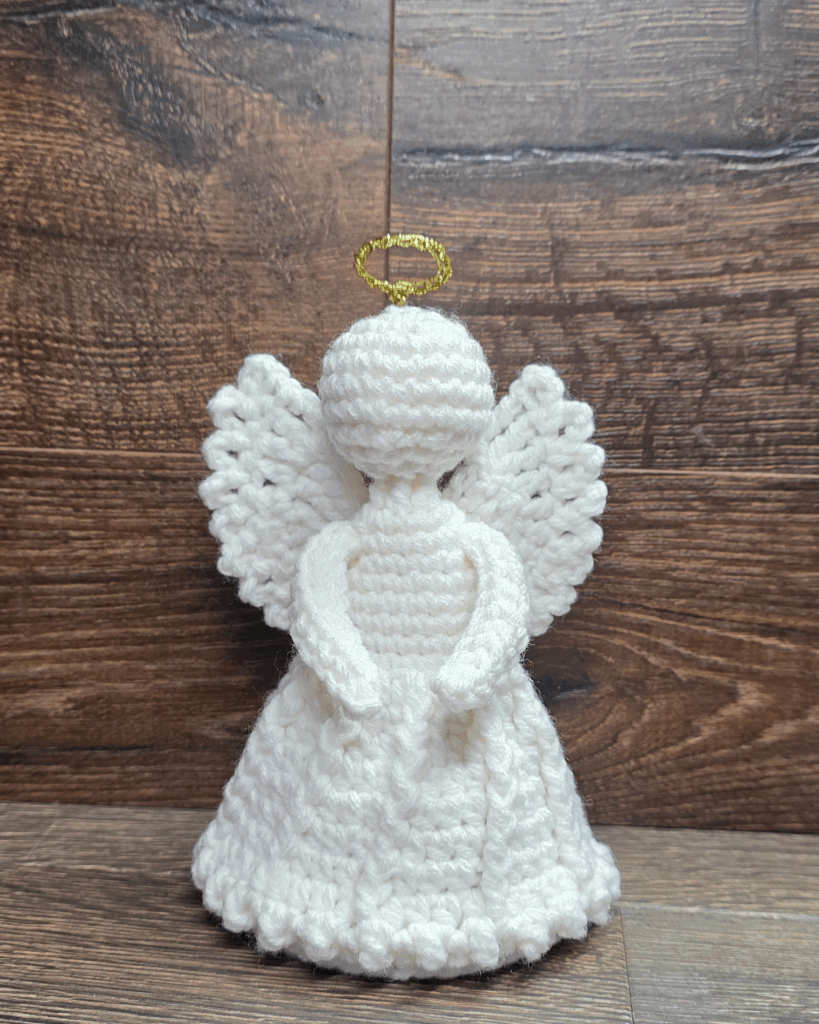 Crochet a Remembrance Angel 🕊️ — only 18 g of yarn needed! One skein makes 11 angels. Free pattern: