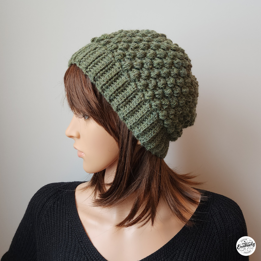 Featuring pretty puff stitches in a soft and warm wool blend yarn, the Upcycled Puff Stitch Hat is a wonderfully cozy accessory. This hat is made from the bottom-up in one-piece.
