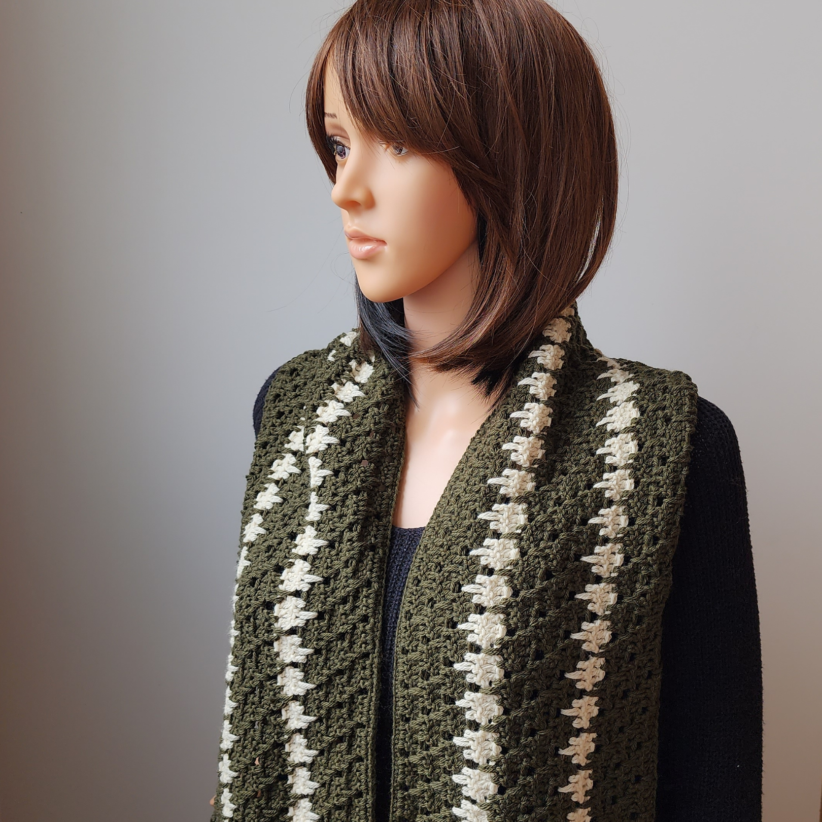 Crochet this easy 2-color scarf with the larksfoot stitch using DK weight yarn. The WTF Scarf pattern is perfect for relaxing projects. #crochetscarf #larksfootstitch #freecrochetpattern #DKyarnproject #crochetaccessories #KingCole #KingColeYarn #KingColeCreations #KingColeAmbassador